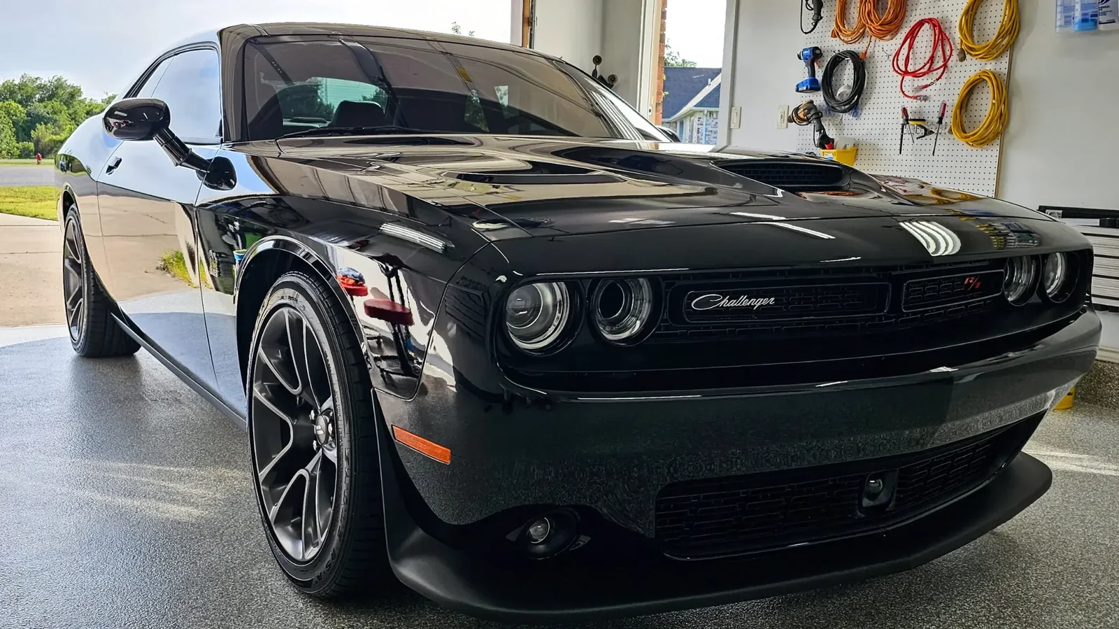 Black Dodge Challenger after ceramic coating at Kaliber Auto Detailing
