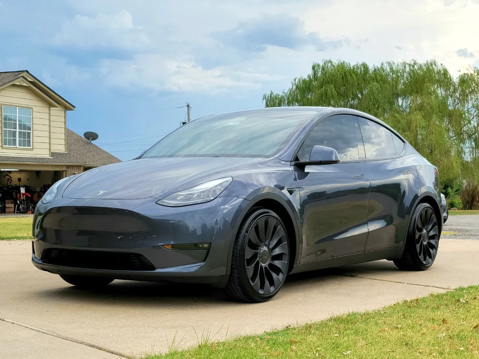 Gray Tesla Model Y after ceramic coating at Kaliber Auto Detailing
